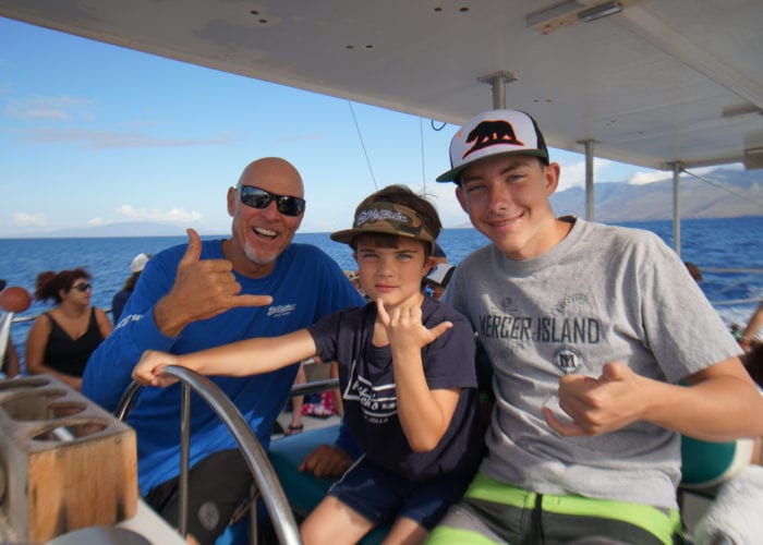 Family In The Boat