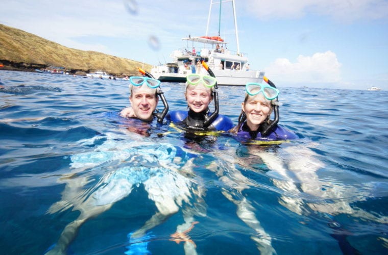 Bueatiful Family Swimming In The Sea