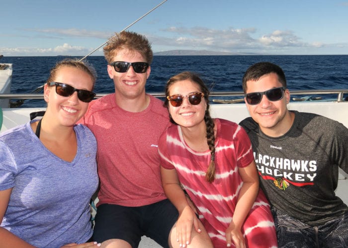 Family In The Boat