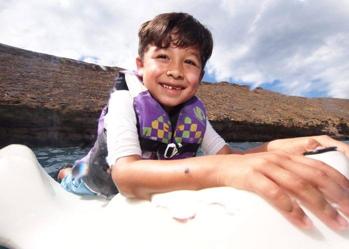 The Boy Playing With Wave