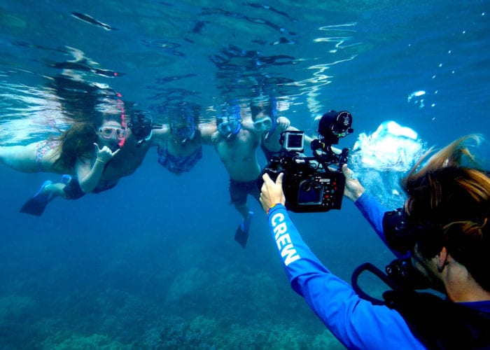 Cameraman Recording Snorkeller